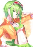  1girl arm_up ascot breasts brooch closed_mouth commentary cropped_jacket gem goggles goggles_on_head green_eyes green_hair green_skirt gumi hand_on_hip head_tilt highres jacket jewelry long_sleeves looking_at_viewer medium_breasts megpoid_(vocaloid3) navel open_clothes open_jacket orange_background orange_jacket pleated_skirt ruby_(gemstone) shiohari_kanna short_hair sidelocks skirt smile solo sparkle stomach suspender_skirt suspenders underboob vocaloid white_neckwear 