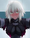  1girl ahoge black_cape blonde_hair blush breasts cape chain clenched_teeth embarrassed fate/grand_order fate_(series) feather_trim full-face_blush hasebe_akira highres jeanne_d&#039;arc_(alter)_(fate) jeanne_d&#039;arc_(fate)_(all) looking_at_viewer medium_breasts solo sweatdrop tearing_up teeth wall_slam yellow_eyes 