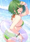  1girl :d arm_up ass back bare_arms bare_shoulders bikini breasts cu-no day from_behind green_bikini green_eyes green_hair hair_ornament hairclip halterneck hisen_kaede innertube looking_at_viewer looking_back nonono_futaba outdoors scrunchie short_hair small_breasts smile solo standing string_bikini swimsuit wet wrist_scrunchie wristband x_hair_ornament 