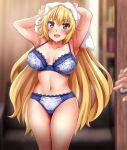  1girl absurdres blonde_hair blue_bra blue_eyes blue_panties blurry bra breasts cameltoe collarbone commentary_request cowboy_shot depth_of_field fate/apocrypha fate/grand_order fate_(series) frilled_bra frilled_panties frills highres jeanne_d&#039;arc_(fate) jeanne_d&#039;arc_(fate/apocrypha) large_breasts long_hair looking_at_viewer navel panties solo towel towel_on_head underwear underwear_only zanntetu 