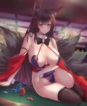  1girl absurdres amagi_(azur_lane) animal_ears azur_lane bare_shoulders black_hair black_legwear blurry blurry_background blush bow bowtie breasts casino cleavage closed_mouth commentary_request detached_collar detached_sleeves eyebrows_visible_through_hair fox_ears fox_girl fox_tail hair_ornament highleg highleg_leotard highres huge_breasts indoors large_breasts leotard multiple_tails poker_chip purple_eyes purple_leotard satou_aji sideboob solo tail thighhighs thighs wrist_cuffs 