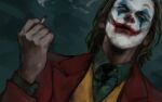  1boy cigarette closed_mouth clown collared_shirt commentary_request dark_background facepaint green_hair highres holding jacket joker_(2019) joker_(dc) long_sleeves male_focus nakano_(mitinni_tk) red_suit shirt short_hair simple_background smile smoke solo 