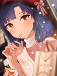  1girl bangs beret blue_hair blunt_bangs blurry blurry_background blush bow cup disposable_cup drink frappuccino hanamasa_ono hat highres idolmaster idolmaster_million_live! indoors light_particles long_hair looking_at_viewer medium_hair nanao_yuriko orange_eyes pink_sweater red_headwear ribbed_sweater solo spoon striped striped_bow sweater turtleneck upper_body utensil_in_mouth window 