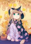  1girl 40hara animal_ear_fluff animal_ears aqua_eyes bangs blonde_hair blunt_bangs cat_ears cat_tail cloak commentary_request eyebrows_visible_through_hair halloween hat highres jack-o&#039;-lantern kinako_(40hara) long_hair original oversized_clothes photo-referenced sitting solo tail witch_hat 