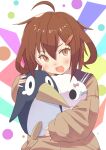  1girl ahoge black_sailor_collar brown_eyes brown_hair brown_sweater commentary_request failure_penguin fang hair_ornament hairclip ikazuchi_(kancolle) kantai_collection looking_at_viewer miss_cloud open_mouth sailor_collar sanninme_no_haru short_hair sleeves_past_wrists smile solo stuffed_toy sweater upper_body 