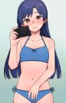  1girl black_panties blue_background blue_bra blue_hair blush bra brown_eyes camera closed_mouth collarbone commentary_request cowboy_shot hand_up holding holding_camera idolmaster idolmaster_million_live! idolmaster_million_live!_theater_days kisaragi_chihaya korean_commentary kwaejina looking_at_viewer mixed-language_commentary navel panties side-tie_panties simple_background smile solo standing straight_hair underwear 