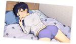  1boy ass bangs bed black_hair blanket blue_eyes boxer_briefs cable cellphone head_tilt highres holding holding_phone long_sleeves looking_at_viewer lying male_focus male_underwear on_stomach original parted_lips phone pillow pillow_(nutsfool) shirt smartphone solo star_(symbol) star_print underwear white_shirt 