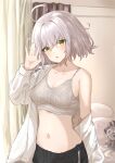  1girl absurdres ahoge bangs black_shorts bra breasts collarbone commentary_request fate/grand_order fate_(series) highres indoors jeanne_d&#039;arc_(alter)_(fate) jeanne_d&#039;arc_(fate) kohaku_teru long_sleeves medium_breasts navel open_clothes open_shirt shirt short_hair shorts silver_hair solo tsurime underwear white_bra white_shirt yellow_eyes 