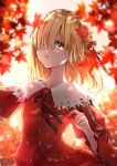  1girl aki_shizuha autumn_leaves backlighting bangs blonde_hair bow branch breasts buttons collarbone collared_shirt commentary_request hair_ornament hair_over_one_eye highres holding holding_leaf juliet_sleeves leaf leaf_hair_ornament long_sleeves looking_at_viewer medium_hair puffy_sleeves red_bow red_ribbon red_shirt ribbon shironeko_yuuki shirt small_breasts solo touhou upper_body wide_sleeves yellow_eyes 