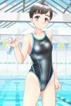  1girl absurdres black_hair black_swimsuit blue_eyes breasts clothes_writing commentary_request competition_swimsuit cowboy_shot highres indoors lane_line looking_at_viewer one-piece_swimsuit original pool short_hair small_breasts solo standing string_of_flags swim_cap_removed swimsuit takafumi water white_headwear 