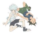  2boys :o bangs black_eyes black_hair black_shorts blue_tank_top commentary dirty gon_freecss green_shorts grin highres hunter_x_hunter killua_zoldyck lying male_focus multiple_boys on_back one_eye_closed shorts silver_hair simple_background sitting smile spiked_hair sweat tank_top toripippi_7 white_background white_tank_top 