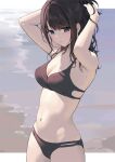  1girl armpits arms_up beach bikini black_bikini black_hair blue_eyes breasts cleavage collarbone cowboy_shot day earrings gin00 hands_in_hair highres idolmaster idolmaster_shiny_colors jewelry kazano_hiori long_hair looking_at_viewer mole mole_under_mouth navel outdoors outside_border parted_lips ponytail small_breasts smile solo stomach stud_earrings swimsuit water 