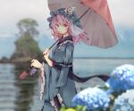  1girl arm_garter bangs blue_flower blue_kimono blurry blurry_background blurry_foreground blush breasts bush commentary eyebrows_visible_through_hair flower frilled_shirt_collar frilled_sleeves frills hat holding holding_umbrella hydrangea japanese_clothes kimono large_breasts long_sleeves looking_at_viewer mob_cap obi pink_eyes pink_hair saigyouji_yuyuko sash short_hair smile solo standing tamagogayu1998 touhou triangular_headpiece umbrella upper_body wide_sleeves 