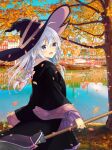  1girl ahoge autumn_leaves black_headwear blush boat bow braid broom commentary_request dot_nose elaina_(majo_no_tabitabi) eyebrows_visible_through_hair hair_between_eyes hair_bow hat highres holding holding_broom lake leaves_in_wind long_hair long_sleeves majo_no_tabitabi nakki_(toarumajyutushi) open_mouth purple_eyes reflection reflective_water revision river signature silver_hair smile solo tree watercraft white_hair wide_sleeves wind witch witch_hat 