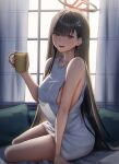  1girl absurdres bare_arms bare_shoulders black_hair blue_archive blush breasts cup dress gileu hair_ornament halo highres holding holding_cup indoors large_breasts long_hair looking_at_viewer parted_lips pillow red_eyes rio_(blue_archive) sitting sleeveless smile solo thighs white_dress 