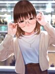  1girl adjusting_eyewear bangs blurry blurry_background blush brown_eyes brown_hair brown_skirt cardigan closed_mouth commentary earrings eyebrows_visible_through_hair glasses hands_up head_tilt highres indoors jewelry long_sleeves looking_at_viewer medium_hair mole mole_under_eye nail_polish necklace original saitou_(lynx-shrike) shirt skirt smile solo standing white_cardigan white_shirt 