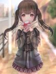  1girl blurry blurry_background blush box brown_eyes brown_hair coat day duffel_coat gift gift_box highres holding holding_box holding_gift jacket long_hair long_sleeves looking_at_viewer original outdoors plaid plaid_skirt pleated_skirt scarf skirt solo temari_latte twintails 