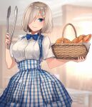  1girl basket blue_dress blue_eyes blush bow bowtie bread breasts closed_mouth commentary dress food hair_ornament hair_over_one_eye hairclip hamakaze_(kancolle) highres holding holding_basket holding_food holding_tongs indoors kantai_collection kasumi_(skchkko) kobeya kobeya_uniform large_breasts looking_at_viewer plaid short_hair short_sleeves silver_hair solo standing tongs 