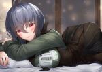  1girl antenna_hair bangs bed bed_sheet breasts closed_mouth grey_hair hair_between_eyes honkai_(series) honkai_impact_3rd indoors long_hair long_sleeves looking_at_viewer lying medium_hair mole mole_under_mouth on_stomach pillow raven_(honkai_impact_3rd) red_eyes smile solo window xfate 