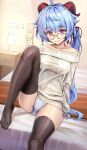  1girl ahoge alternate_costume bangs bare_shoulders bed bed_sheet bespectacled black_legwear blanket blue_hair blush breasts brown-framed_eyewear closed_mouth collarbone eyebrows_visible_through_hair ganyu_(genshin_impact) genshin_impact glasses grey_panties grey_sweater highres horns indoors kotatsu_(kotatsu358) lamp long_hair long_sleeves looking_at_viewer medium_breasts no_pants no_shoes off-shoulder_sweater off_shoulder on_bed panties purple_eyes sitting sitting_on_bed smile solo sweater thighhighs underwear very_long_hair 