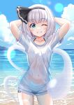  1girl absurdres arms_behind_head beach bikini black_hairband blue_eyes blue_sky cloud cloudy_sky cowboy_shot grin hair_ribbon hairband highres konpaku_youmu konpaku_youmu_(ghost) long_shirt looking_at_viewer ocean one_eye_closed outdoors reimei_(r758120518) ribbon shirt short_hair sky smile solo swimsuit t-shirt touhou wet wet_clothes wet_shirt white_hair white_shirt 