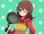  1girl 5-volt blush breasts brown_hair commentary_request frying_pan green_background herunia_kokuoji holding holding_frying_pan looking_at_viewer one_eye_closed polka_dot polka_dot_background signature simple_background smile solo upper_body warioware yellow_eyes 