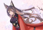  1girl amagi_(azur_lane) animal_ears azur_lane bangs breasts brown_hair chan&#039;nu cherry_blossoms commentary_request fox_ears fox_girl highres japanese_clothes kimono large_breasts long_hair looking_at_viewer purple_eyes smile solo 