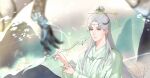  1boy chinese_clothes chinese_hairpin circlet closed_mouth cloud cloudy_sky facial_mark fingernails forehead_mark green_eyes green_hanfu green_sky grey_hair hair_bun hanfu highres holding holding_paintbrush kohanai_setsuna light_particles long_hair long_sleeves looking_ahead male_focus mountain nikki_(series) nostrils paintbrush palms pointy_nose shining_nikki sidelocks single_hair_bun sky smile solo thick_eyebrows thousand-mile_heartland_(shining_nikki) twitter_username upper_body very_long_hair wenren_dian_(shining_nikki) wide_sleeves wind 