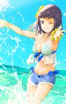  1girl bikini blue_bikini blue_shorts blue_sky breasts brown_eyes brown_hair cleavage commentary_request cowboy_shot day flower front-tie_bikini front-tie_top grin haimura_kiyotaka hair_flower hair_ornament hands_up highres itsuwa medium_breasts medium_hair navel ocean one_eye_closed open_clothes open_shorts outdoors outstretched_arms sanpaku short_shorts shorts sky smile splashing spread_arms standing stomach swimsuit toaru_majutsu_no_index wading water wrist_cuffs yellow_flower 