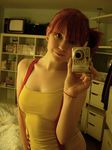  1girl bare_shoulders breasts camera cosplay kasumi_(pokemon)_(cosplay) large_breasts lowres orange_hair photo pokemon red_hair short_hair solo 