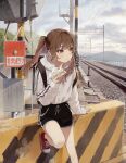  1girl absurdres backpack bag bangs baozi blush breasts brown_eyes brown_hair cloud daluto_(hitomi555) eating food highres hood hoodie long_hair mountain original outdoors railroad_crossing railroad_tracks shorts solo twintails 