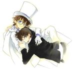  blue_eyes blush brown_hair cape formal gloves hand_kiss hat hug kaitou_kid kiss kudou_shin'ichi kuroba_kaito lying male_focus meitantei_conan monocle multiple_boys smile suit top_hat toujou_sakana yaoi 