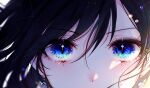 1girl bangs black_hair blue_eyes close-up commentary constellation earrings english_commentary eye_focus floating_hair gem green_eyes hair_between_eyes highres jewelry looking_at_viewer mole mole_under_eye moon_so_00 original solo sparkle swept_bangs 