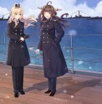  2girls ahoge alternate_costume battleship black_coat black_footwear black_headwear black_pants blonde_hair blue_eyes blue_sky box brown_gloves brown_hair cane cloud coat crown day detached_sleeves double_bun gloves hat headgear highres himeyamato hms_dreadnought holding holding_cane kantai_collection kongou_(kancolle) long_hair long_sleeves medium_hair military military_vehicle mini_crown multiple_girls ocean one_eye_closed pants purple_eyes remodel_(kantai_collection) ship shoes sky snowing warship warspite_(kancolle) watercraft white_gloves 