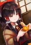  1girl absurdres ascot black_hair bow brown_eyes closed_mouth food fruit hair_bow hair_tubes hakurei_reimu highres holding holding_food holding_fruit japanese_clothes kotatsu mandarin_orange matsukuzu medium_hair red_bow sidelocks solo table touhou yellow_ascot 