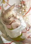  1girl absurdres animal_ear_fluff animal_ears arknights bare_shoulders barefoot beanstalk_(arknights) beanstalk_(gift_uncompleted)_(arknights) blurry blurry_background braid brown_hair christmas_tree closed_mouth depth_of_field dress from_behind green_dress hair_over_shoulder highres kioroshin kneehighs long_hair long_sleeves looking_at_viewer looking_back off-shoulder_sweater off_shoulder official_alternate_costume red_eyes short_dress signature single_braid single_kneehigh sitting smile solo sweater symbol-only_commentary white_legwear white_sweater 