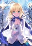  1girl ahoge artoria_pendragon_(fate) blonde_hair blue_ribbon blue_scarf blue_skirt coat fate/stay_night fate_(series) green_eyes hair_bun hair_ribbon highres lamppost long_sleeves neko_daruma outdoors ribbon saber scarf sidelocks skirt solo white_coat 