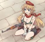  1girl ak-47 ak-47_(girls&#039;_frontline) assault_rifle beret bikini black_shorts blonde_hair blue_eyes boots breasts bullet commentary front-tie_bikini front-tie_top girls&#039;_frontline green_bikini grin gun hammer_and_sickle hammer_and_sickle_tattoo hat kalashnikov_rifle kneeling korean_commentary large_breasts long_hair looking_to_the_side mouth_hold navel red_headwear red_scarf rifle scarf shorts sidarim sitting smile solo star_(symbol) swimsuit teeth weapon 