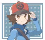  1boy adjusting_clothes adjusting_headwear arm_up baseball_cap blue_jacket border brown_eyes brown_hair chocomiru closed_mouth commentary english_commentary hand_on_headwear happy hat hilbert_(pokemon) hood hood_down hooded_jacket jacket long_sleeves looking_at_viewer male_focus outside_border poke_ball_print pokemon pokemon_(game) pokemon_bw polka_dot polka_dot_background red_headwear short_hair solo strap white_border 