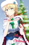  1girl bangs blonde_hair blue_eyes blurry blurry_background blush bow braid cape christmas christmas_tree closed_mouth commentary darjeeling_(girls_und_panzer) depth_of_field dress english_text eyebrows_visible_through_hair finger_to_mouth fur-trimmed_cape fur_trim gift girls_und_panzer girls_und_panzer_senshadou_daisakusen! green_bow hat highres holding holding_gift index_finger_raised looking_at_viewer merry_christmas off-shoulder_dress off_shoulder official_alternate_costume red_cape red_headwear redbaron santa_hat short_hair short_sleeves shushing smile snowing solo standing tied_hair twin_braids twitter_username white_dress 