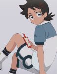  1boy bangs black_hair black_legwear blue_eyes boots closed_mouth commentary_request eyelashes goh_(pokemon) grey_background holding holding_phone kouzuki_(reshika213) looking_at_viewer male_focus phone pokemon pokemon_(anime) pokemon_swsh_(anime) rotom rotom_phone school_uniform shirt short_sleeves shorts socks white_footwear white_shorts 