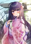  1girl ahoge bangs black_hair blurry blurry_background blush closed_mouth commentary_request day depth_of_field eyebrows_visible_through_hair floral_print flower hair_between_eyes hair_flower hair_ornament hatsumoude highres holding japanese_clothes kimono long_hair long_sleeves looking_at_viewer minami_saki obi omikuji original outdoors pink_kimono print_kimono purple_eyes red_flower sash sleeves_past_wrists smile solo torii very_long_hair wide_sleeves 