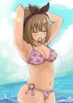  1girl absurdres arm_behind_head armpits arms_up atelier_(series) atelier_ryza bikini blue_sky breasts brown_hair cleavage closed_eyes cloud cowboy_shot day floral_print highres horizon large_breasts nako_maguro2501 o-ring o-ring_bottom ocean outdoors pink_bikini reisalin_stout short_hair sky soaking_feet solo swimsuit 