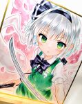  1girl belt black_belt black_bow black_bowtie black_hairband black_ribbon blue_hair blush border bow bow_hairband bowtie breast_pocket breasts buttons collared_shirt colored_inner_hair cowboy_shot fingernails green_eyes green_skirt green_vest grey_hair hair_between_eyes hairband hashtag-only_commentary highres hitodama hitodama_print holding holding_sword holding_weapon katana konpaku_youmu konpaku_youmu_(ghost) looking_at_viewer mejina_nyaa multicolored_hair open_mouth outside_border petals pink_background pocket puffy_short_sleeves puffy_sleeves ribbon shirt short_hair short_sleeves simple_background skirt skirt_set small_breasts solo standing sword touhou traditional_media vest weapon white_border white_shirt 