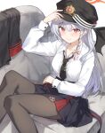  1girl adjusting_clothes adjusting_headwear black_hat black_necktie black_pantyhose black_skirt black_wings blue_archive commentary_request demon_girl demon_tail demon_wings grey_hair hair_between_eyes halo haruna_(blue_archive) hat highres long_hair miya_kazutomo necktie pantyhose peaked_cap red_eyes red_halo shirt skirt solo tail white_shirt wings 