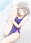  1girl blush breasts brown_hair cleavage competition_swimsuit frown highres kneepits looking_at_viewer love_live! love_live!_sunshine!! matsuoka_michihiro medium_breasts one-piece_swimsuit one_eye_closed poolside solo stretch swimsuit thighs watanabe_you water wet 