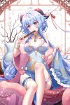  1girl alternate_costume bangs blue_hair blush breasts breasts_apart chinese_clothes closed_fan collarbone curled_horns eyelashes feet_out_of_frame folding_fan fur_trim ganyu_(genshin_impact) genshin_impact goat_horns hand_fan highres holding holding_fan horns knees large_breasts leg_garter long_hair looking_at_viewer open_mouth pillow purple_eyes red_horns round_window sidelocks sitting solo tassel user_jrjf8352 window wrist_cuffs 