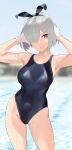  1girl animal_ears blue_eyes blue_swimsuit breasts collarbone competition_swimsuit cowboy_shot fake_animal_ears gloves hair_ornament hair_over_one_eye hairclip hamakaze_(kancolle) highres kantai_collection large_breasts neckerchief one-piece_swimsuit outdoors pool rabbit_ears short_hair silver_hair solo swimsuit wa_(genryusui) water white_gloves yellow_neckerchief 