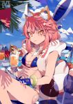  1girl absurdres animal_ear_fluff animal_ears bare_arms bare_legs beach beach_chair bikini bird blue_bikini blue_sky bracelet breasts cleavage closed_mouth cloud commentary cup dated drink drinking_glass fate/grand_order fate_(series) fox_ears heart highres holding holding_drink innertube jewelry long_hair looking_at_viewer magazine_(object) medium_breasts necklace ocean orange_eyes outdoors pink_hair reading sky smile solo string_bikini swimsuit tamamo_(fate) tamamo_no_mae_(fate/extra) taowu_(20809) watermelon_slice 