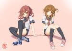  2girls adapted_costume anchor_symbol artist_logo black_legwear blue_footwear breasts brown_hair buruma eyebrows_visible_through_hair fang folded_ponytail gradient gradient_background hair_between_eyes hair_ornament hairclip highres ikazuchi_(kancolle) inazuma_(kancolle) kantai_collection multiple_girls neckerchief pink_background pink_footwear red_neckerchief school_uniform serafuku shirt shoes short_hair sitting small_breasts smile sneakers sportswear tetsuryuu thighhighs 